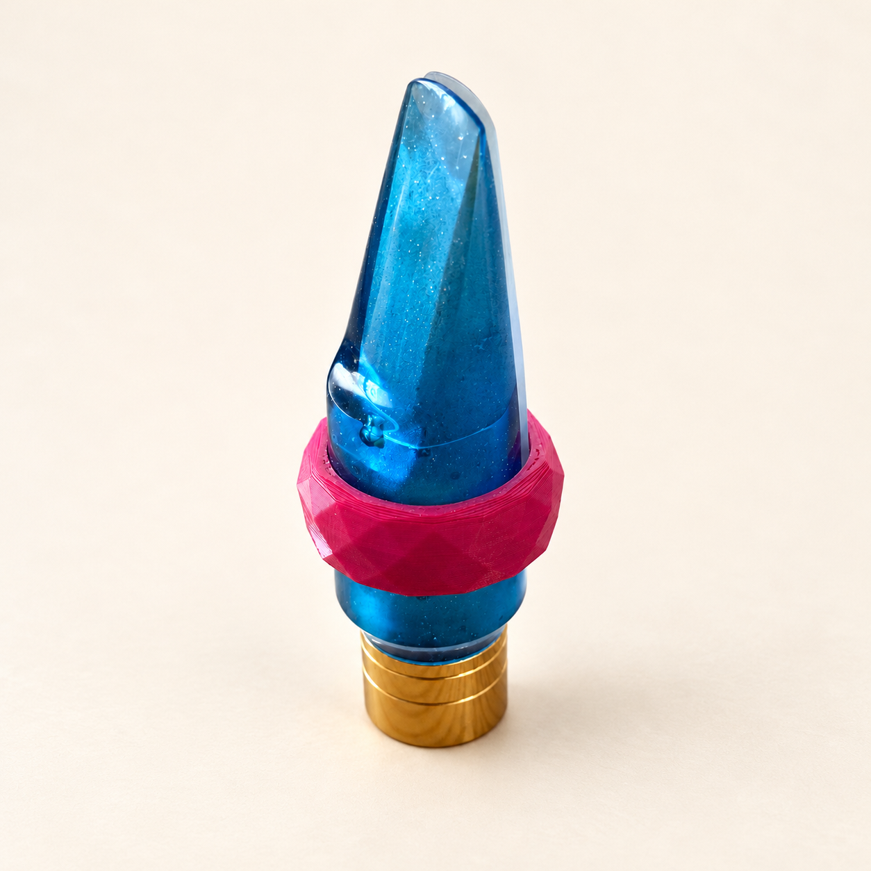 Blue transparent mouthpiece with pink ligature